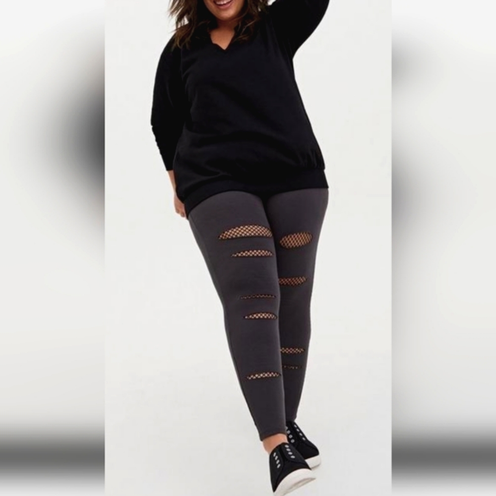 Torrid ripped fishnet legging